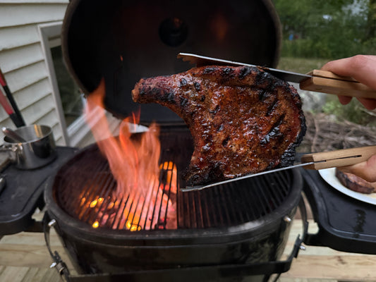 Thick-cut pork chops grilled with a seasoned crust
